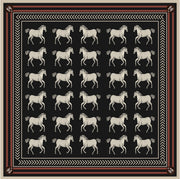 Horse Girl scarf laid flat: rows of cream horses on black with rust and cream borders